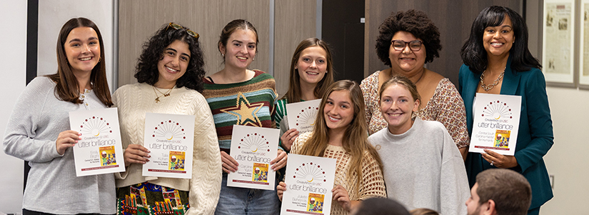 students holding certificates