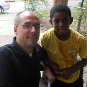 Michael Gibbs Hill with a young person