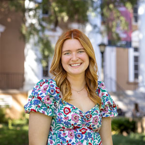 Woman standing in an outdoor area 